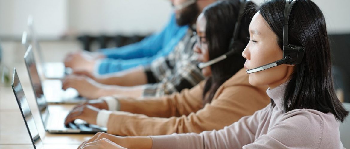 Answering service workers at a table