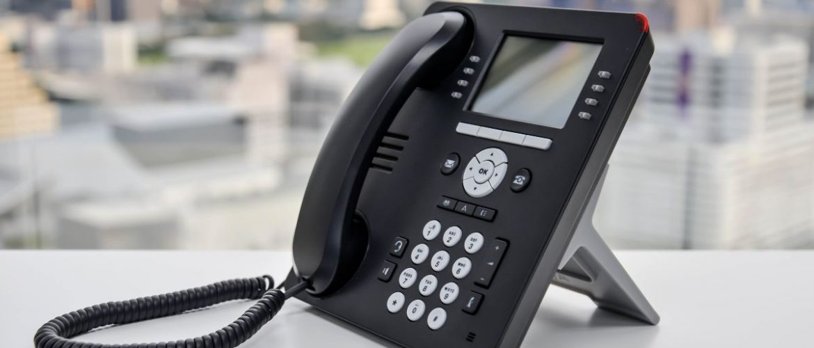 Office phone sitting on table