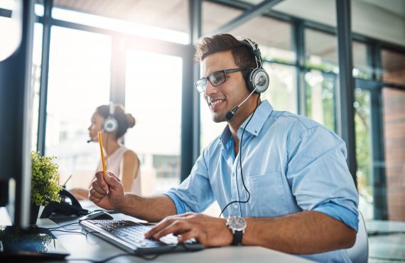 Call answering service expert working at a call center